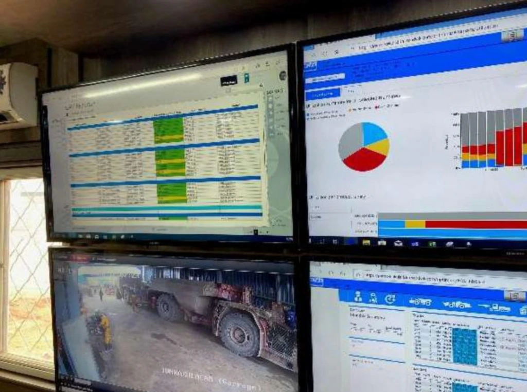 Control room screens showing production and performance data